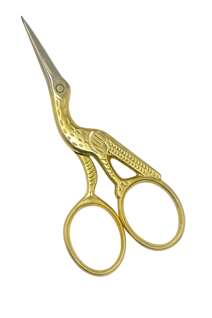 Gold embroidery scissors on a transparent background