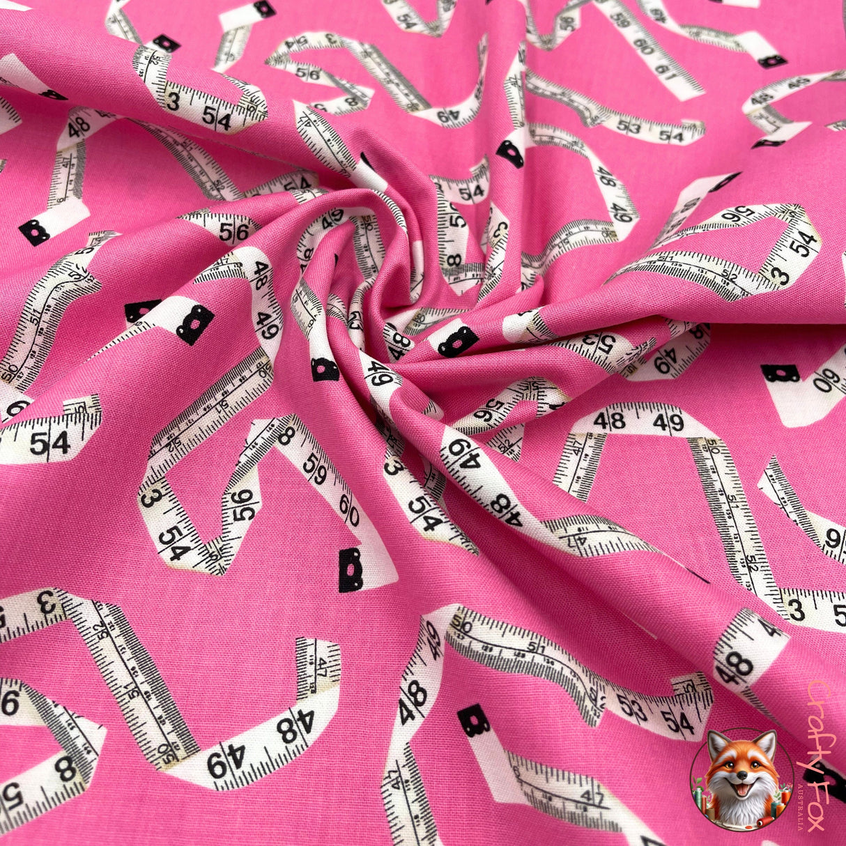 Swirl of fabric Sew! Sew! TapeMeasures on Pink Cotton fabric, Benartex BT8467.22