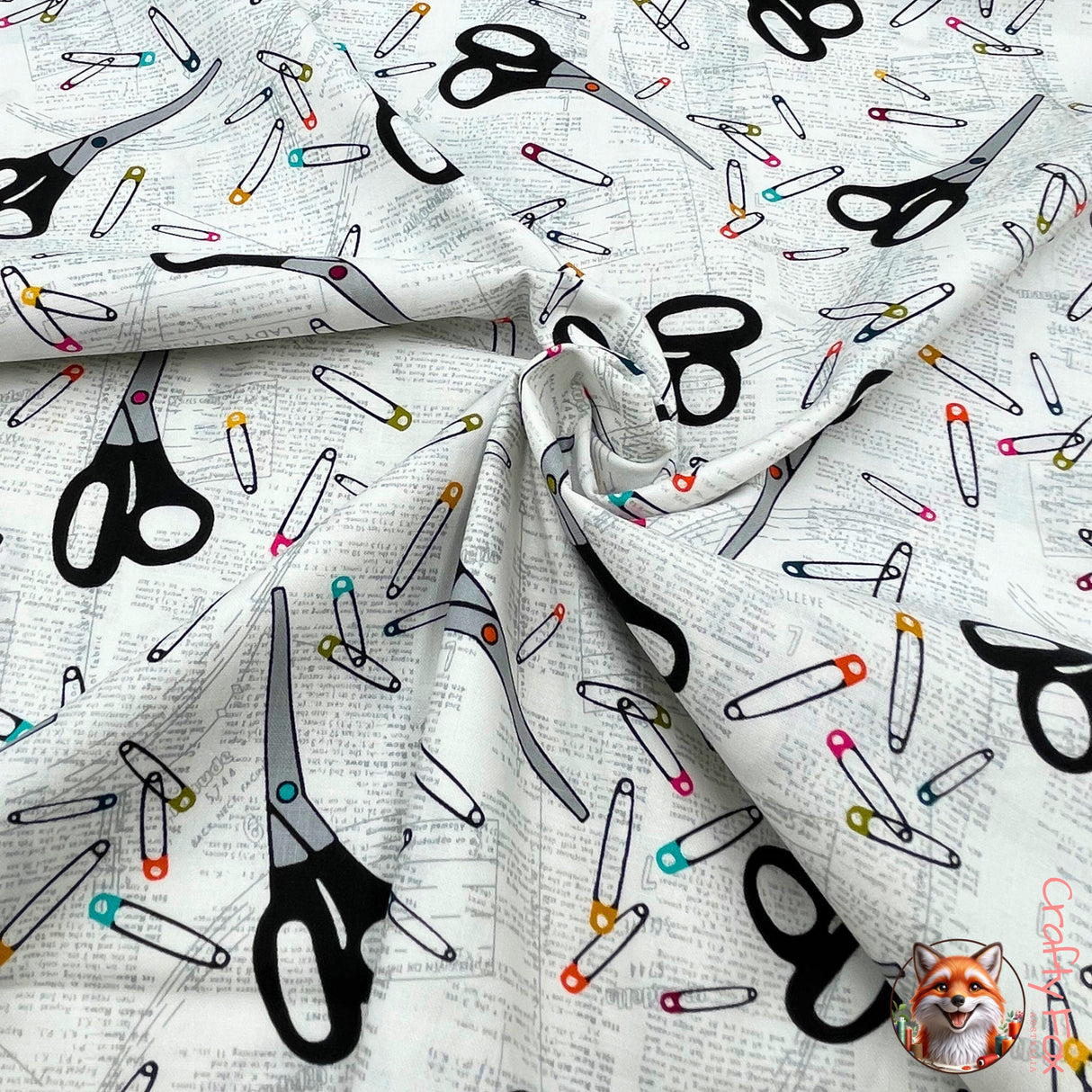 Sew Sew Cotton fabric, twist of fabric showing its fall, pattern of Scissors, Safety Pins, dress patterns Benartex BT8475.09