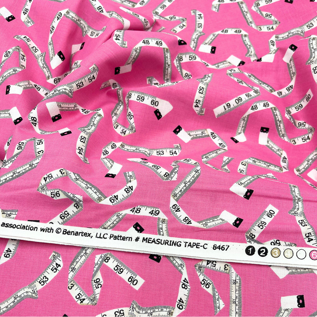 Showing selvage of Sew! Sew! fabric, TapeMeasures on Cotton fabric, Benartex BT8467.22