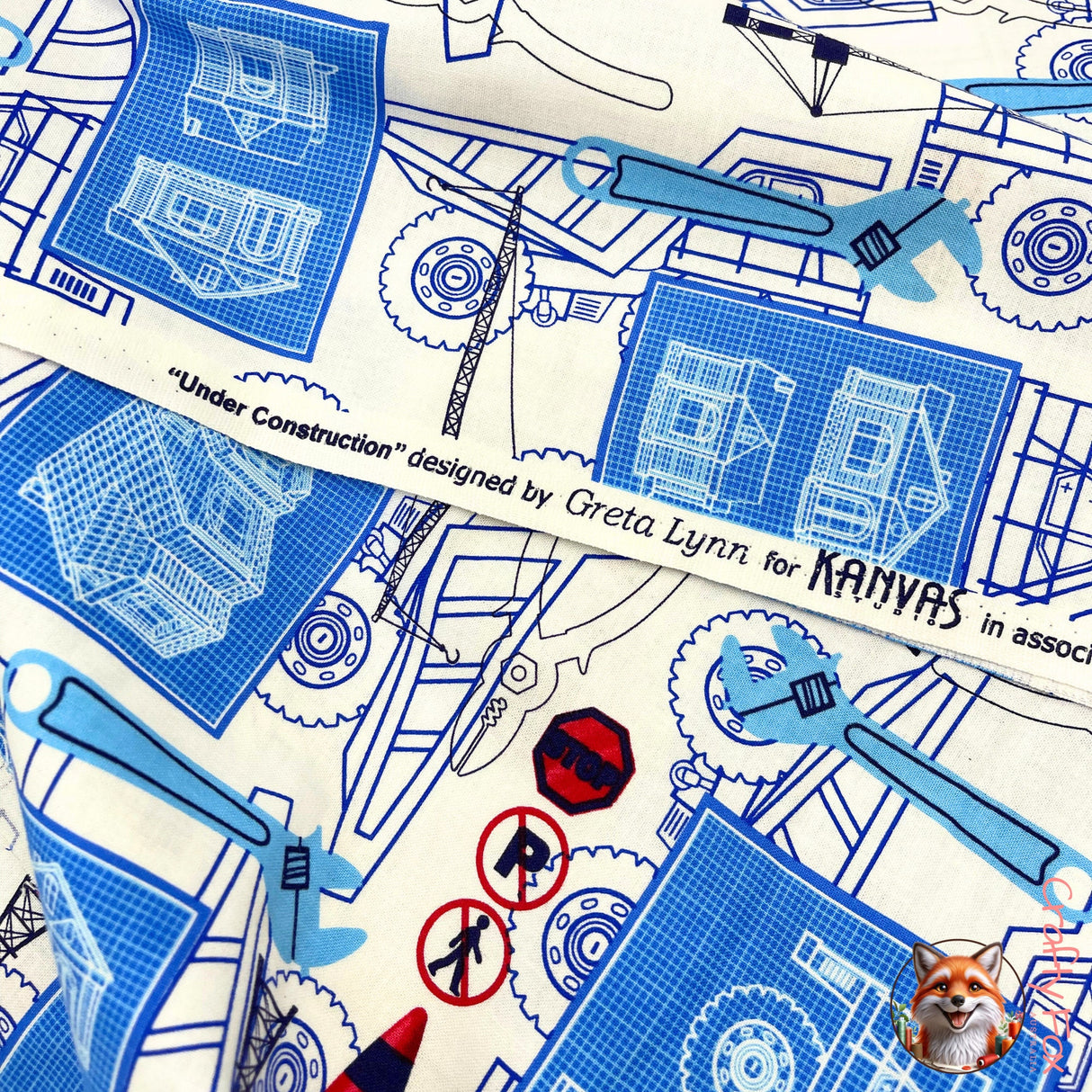 Selvage of Under Construction fabric, by Greta Lynn for Kanvas Benartex