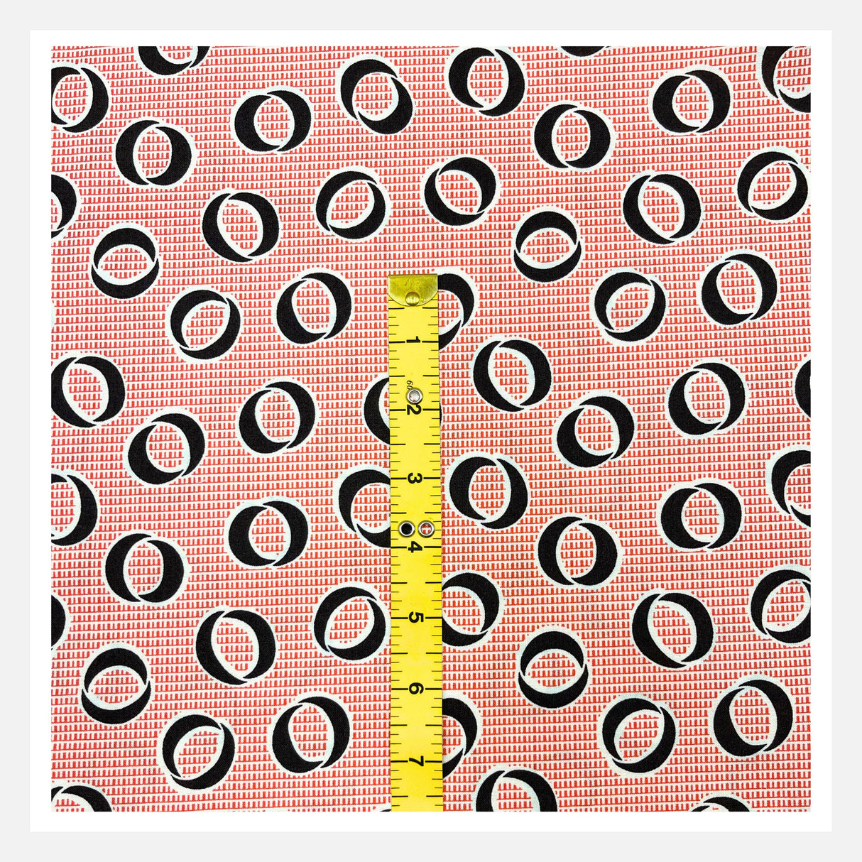 Tape measure in inches showing Calligraphy Circle fabric