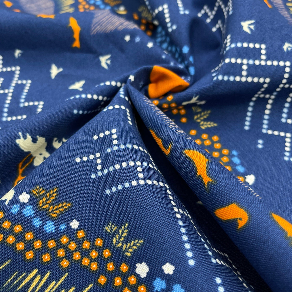 mountain dots, leaves, grass and fish fabric