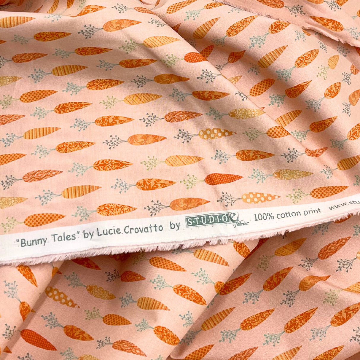 Bunny Tales Fabric with Carrots on Soft Peach - Lucie Crovatto Design