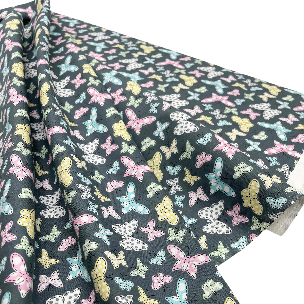 Butterfly Folly Fabric: Multi-Coloured Butterflies on Charcoal - Michael Miller