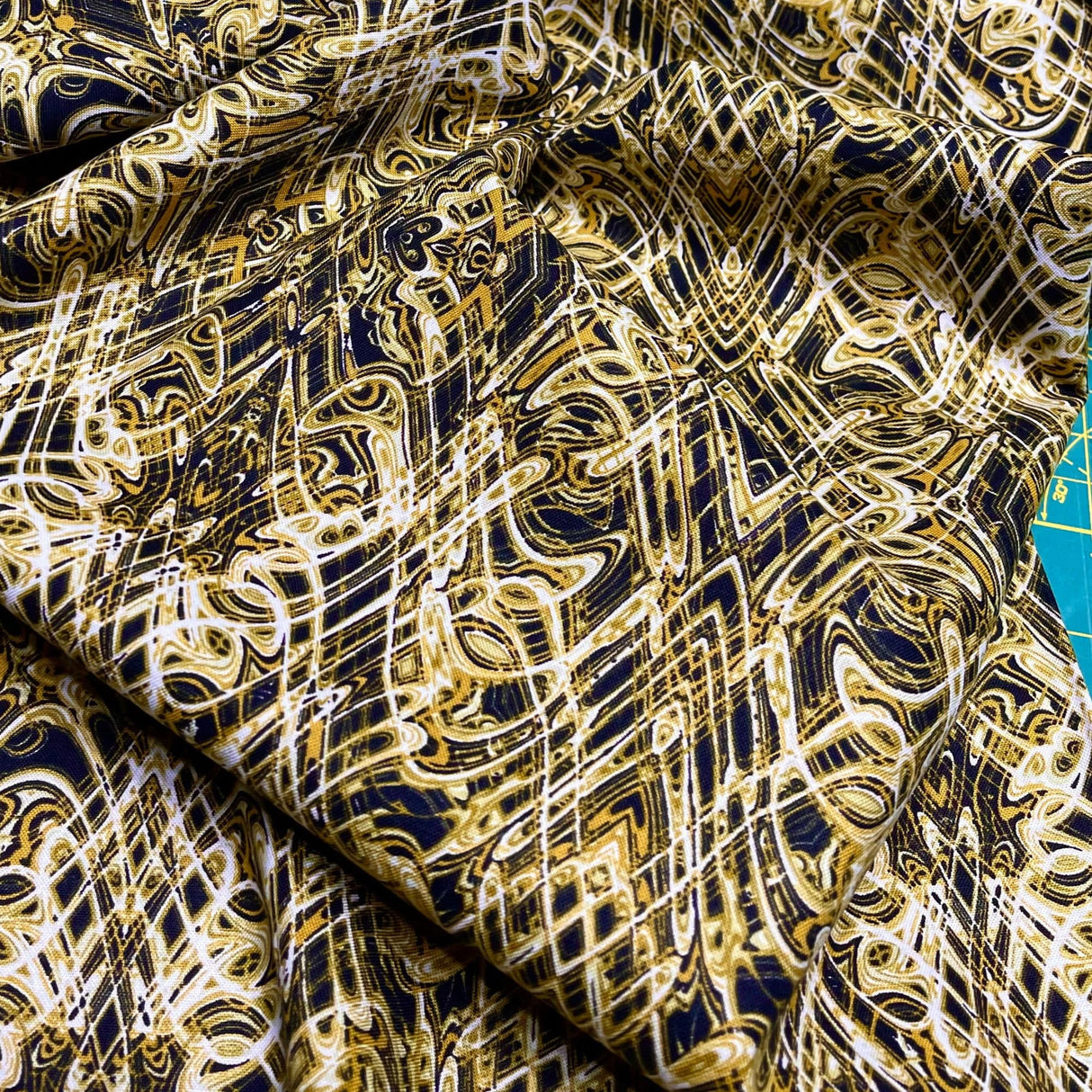 Kismet Gold Black Swirl fabric Geometric Quilt fabric Paula Nadelstern for Benartex BT1774-49