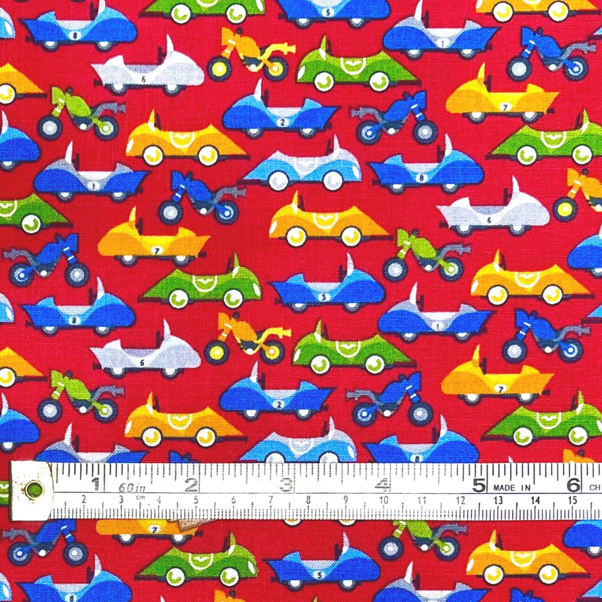 Motorbikes fabric Racing Cars Blue Orange Green on red fabric Safari Drive StudioE fabric SE-3031-88