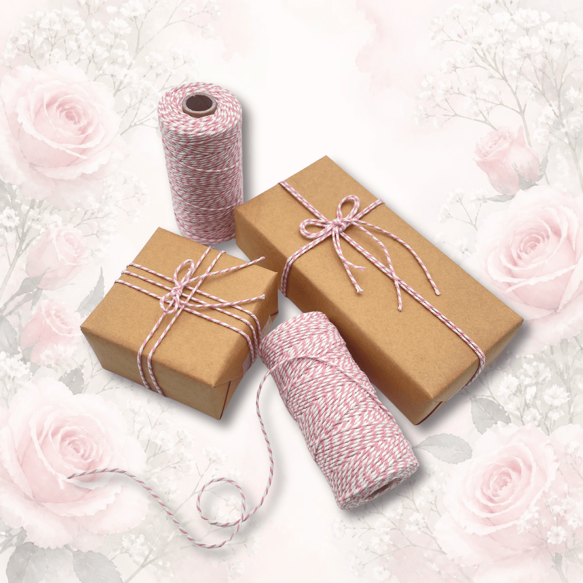 Pink baker’s twine with natural kraft gift wrapping paper and wrapped gifts