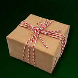 Red baker’s twine tied around natural kraft gift wrapping paper