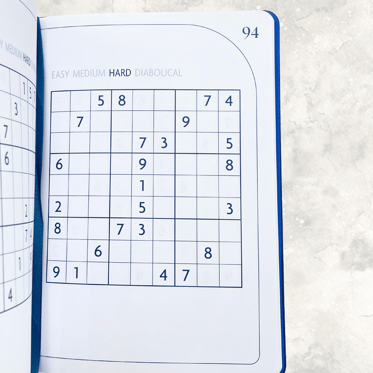 Challenging hard Sudoku puzzles inside the 160-page Sudoku puzzle book