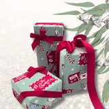 Australian Christmas wrapping paper styled with Scarlet Red grosgrain ribbon