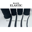 Black elastic bands with measurements on a white background