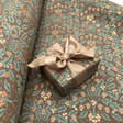 Harvest Cocoa gift wrapping paper with sage foliage, golden acorns and taupe satin ribbon