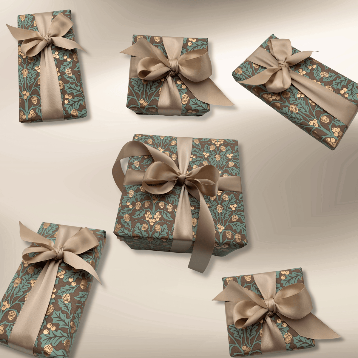 Brown and sage acorn Christmas gift wrap styled with taupe satin bows