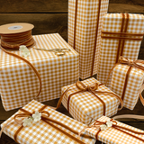 6mm amber velvet ribbon paired with mustard gingham gift wrapping paper and wrapped gifts