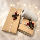 Taupe baker’s twine with natural kraft gift wrapping paper and Christmas embellishments