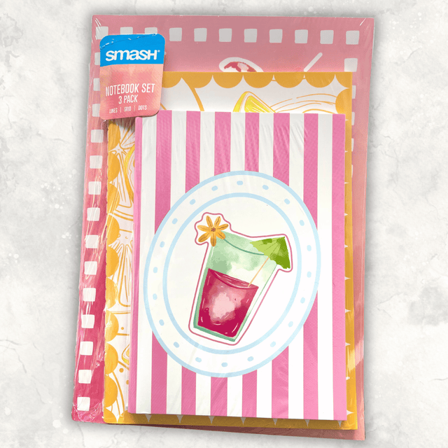 Smash notebook set of 3 in original shrink-wrap packaging, featuring colourful pink, orange and yellow designs with lined, grid and dotted pages.