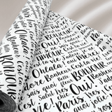 Paris luxury pearlised gift wrapping paper roll featuring elegant black French typography on a soft off-white background, 60cm wide.