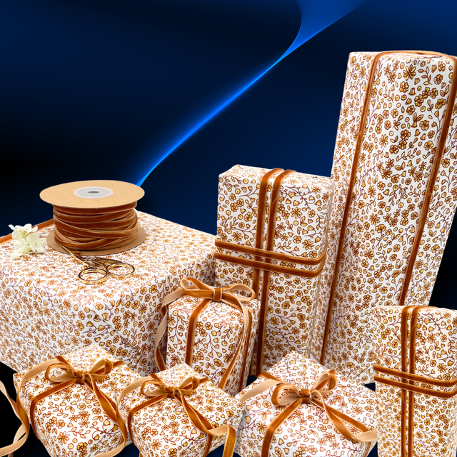 Floral Posy Toffee rustic gift wrapping paper with amber velvet ribbon and wrapped gifts