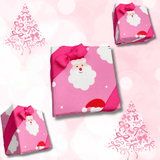 Santa Pink Christmas gift wrap on assorted gift boxes with coordinating pink ribbon
