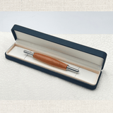 Handcrafted wooden seam ripper presented in an elegant black gift box