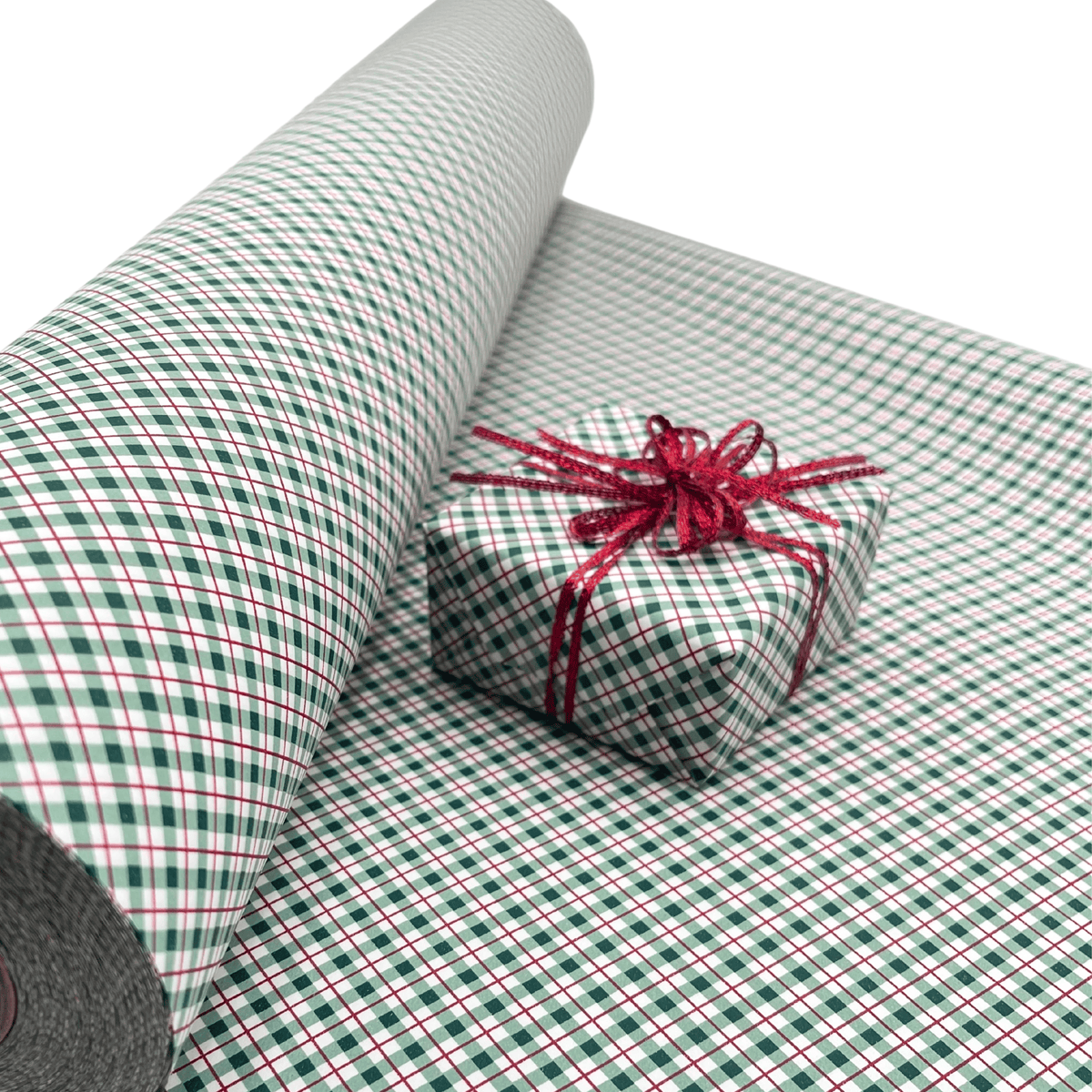 Red green and white check Christmas wrapping paper with coordinating red ribbon
