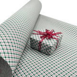 Red green and white check Christmas wrapping paper with coordinating red ribbon