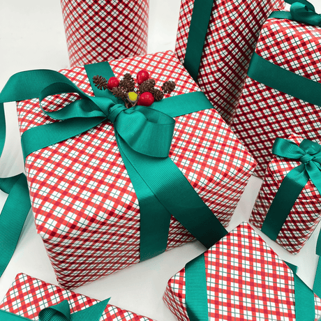 Red green and white check Christmas wrapping paper with Evergreen ribbon