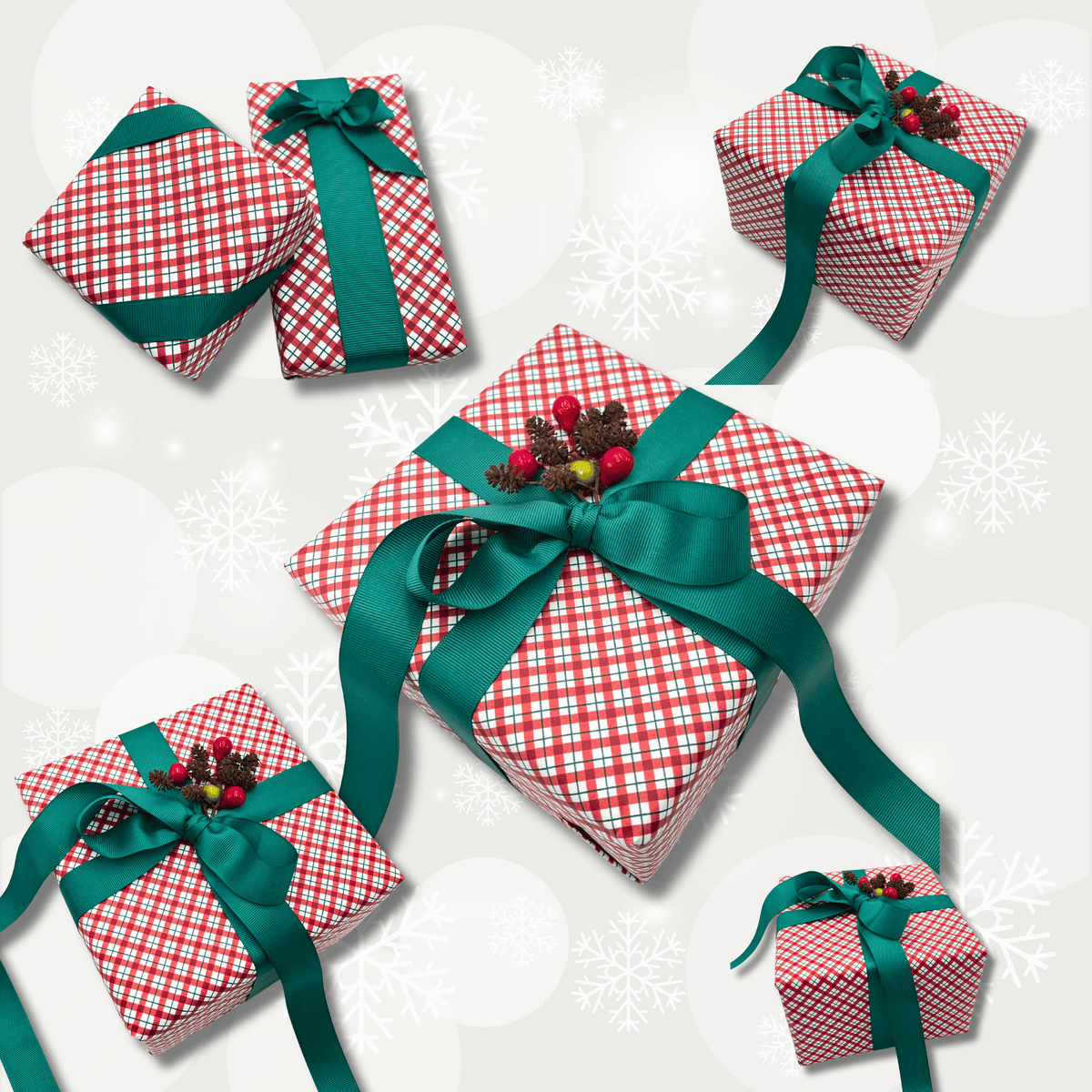 Yuletide Red Christmas gift wrap styled on assorted gift boxes with green ribbon