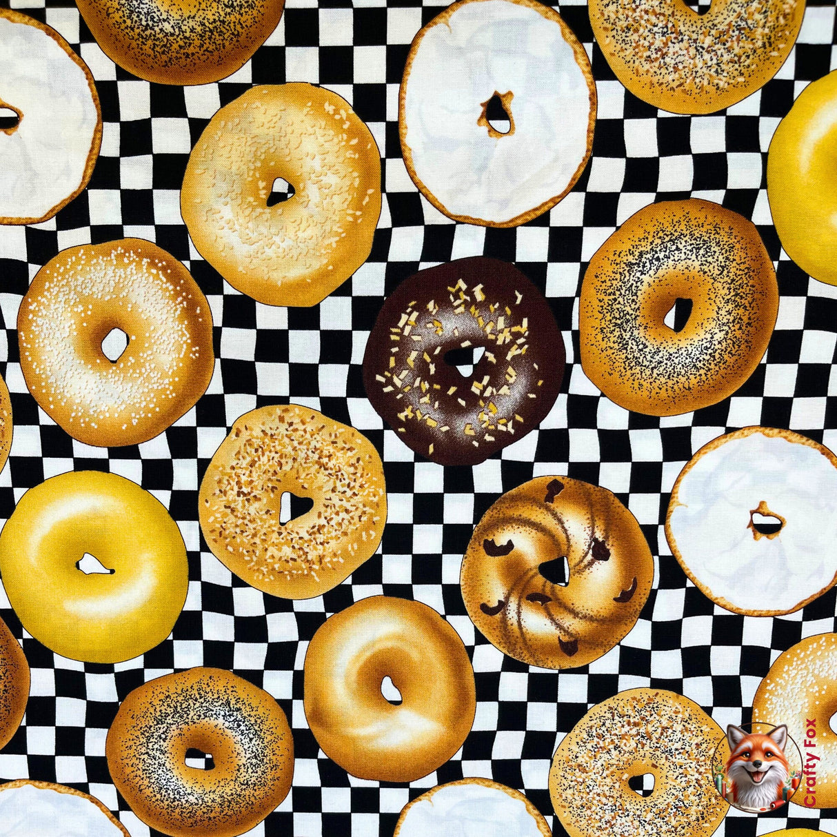 A variety of different bagels on a chequered black and white background cloth, category for Food Drink, this is Quilting, Cotton, Novelty Fabric, by Timeless Treasures Fabrics - Fabric Code TT-GM.C6003