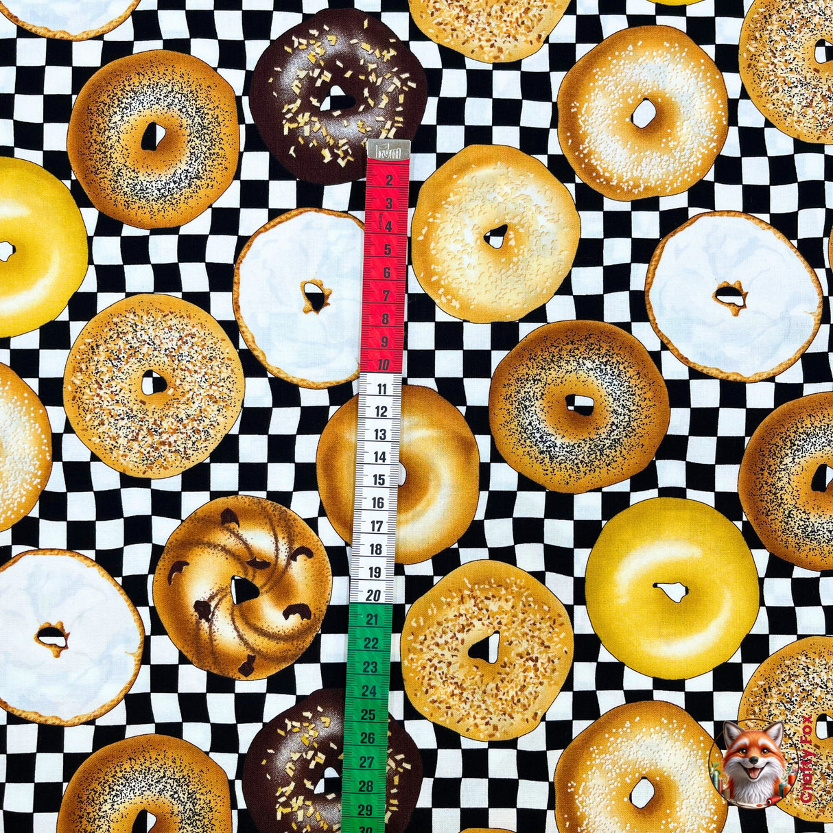 Vertical measurement of Bagels with a measuring tape. Category for Food Drink, this is Quilting, Cotton, Novelty Fabric, by Timeless Treasures Fabrics - Fabric Code TT-GM.C6003