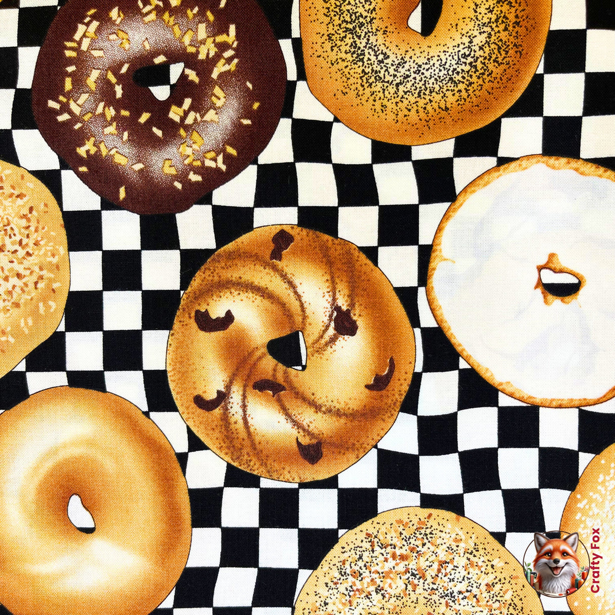 Bagel with chocolate design on top, this fabric is surrounded with other variety of bagels, category for Food Drink, this is Quilting, Cotton, Novelty Fabric, by Timeless Treasures Fabrics - Fabric Code TT-GM.C6003