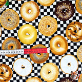 Horizontal measurement of Bagel fabric, showing a variety of bagels. Category for Food Drink, this is Quilting, Cotton, Novelty Fabric, by Timeless Treasures Fabrics - Fabric Code TT-GM.C6003