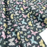 Butterfly Folly Fabric: Multi-Coloured Butterflies on Charcoal - Michael Miller