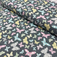 Butterfly Folly Fabric: Multi-Coloured Butterflies on Charcoal - Michael Miller