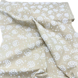 Folded fabric of Tone on Tone by SewTrade: Essential Dandelions Quilting Cotton