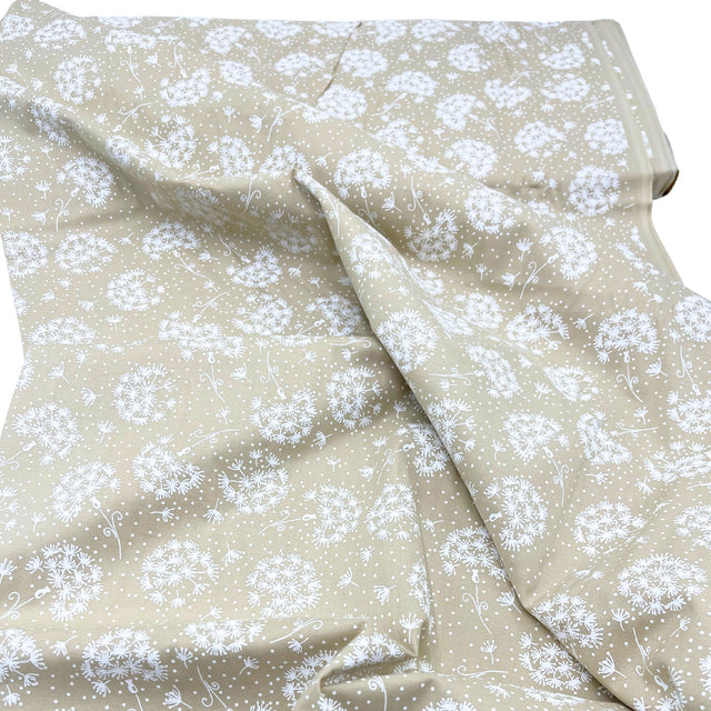 Folded fabric of Tone on Tone by SewTrade: Essential Dandelions Quilting Cotton