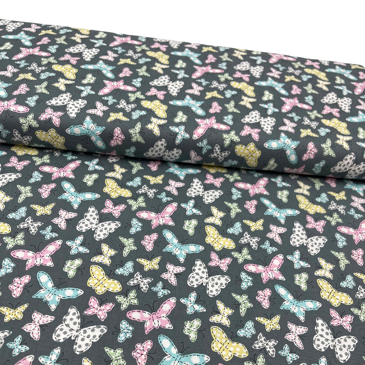 Butterfly Folly Fabric: Multi-Coloured Butterflies on Charcoal - Michael Miller