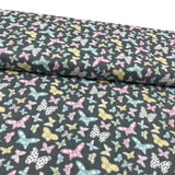 Butterfly Folly Fabric: Multi-Coloured Butterflies on Charcoal - Michael Miller