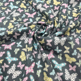 Butterfly Folly Fabric: Multi-Coloured Butterflies on Charcoal - Michael Miller