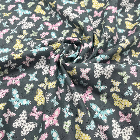 Butterfly Folly Fabric: Multi-Coloured Butterflies on Charcoal - Michael Miller