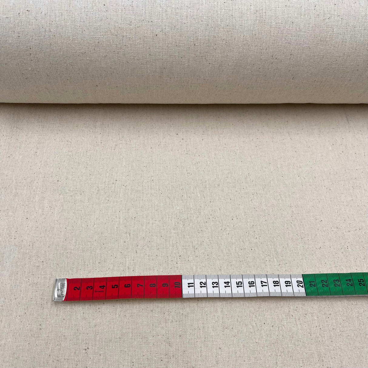 Tape measure showing Osnaburg fabric