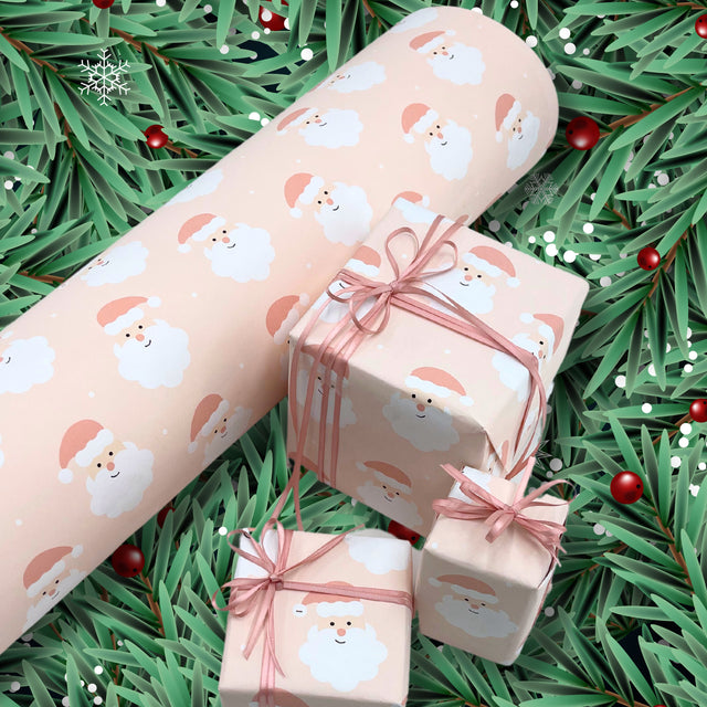 Santa Blush pink Christmas gift wrapping paper with Santa face design